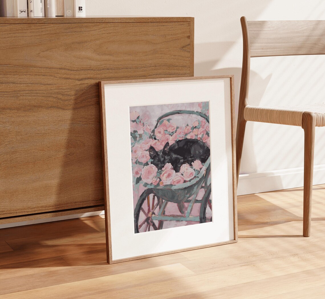 Black Cat Sleeping In Wheelbarrow Of Pink Roses Garden Poster - Image 2