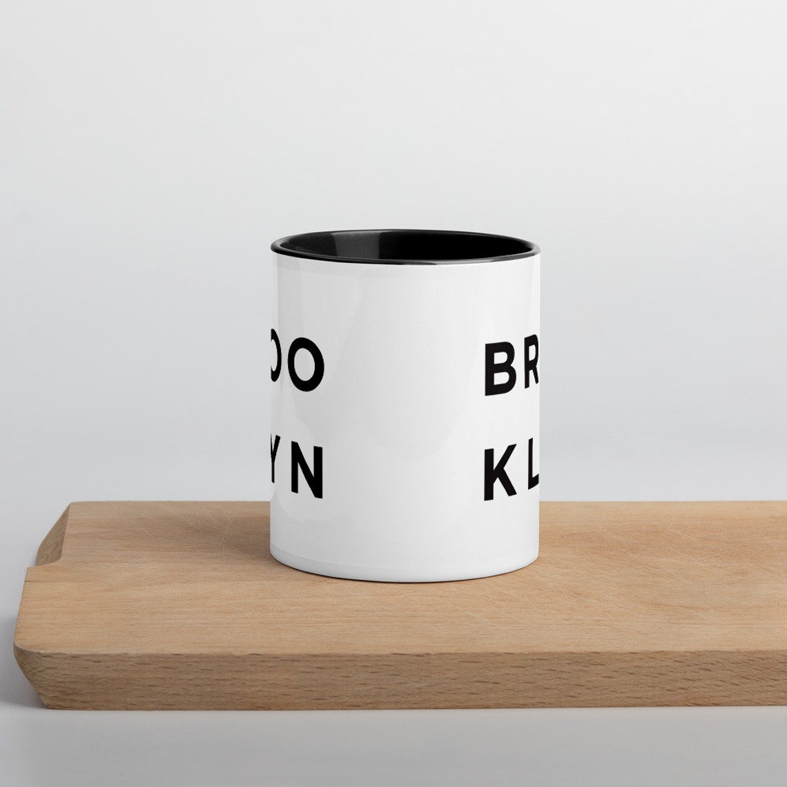 Brooklyn Bold Block Letter White Ceramic Mug Black Interior Print