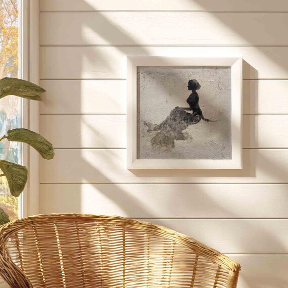 Seated Figure Silhouette On Neutral Plaster