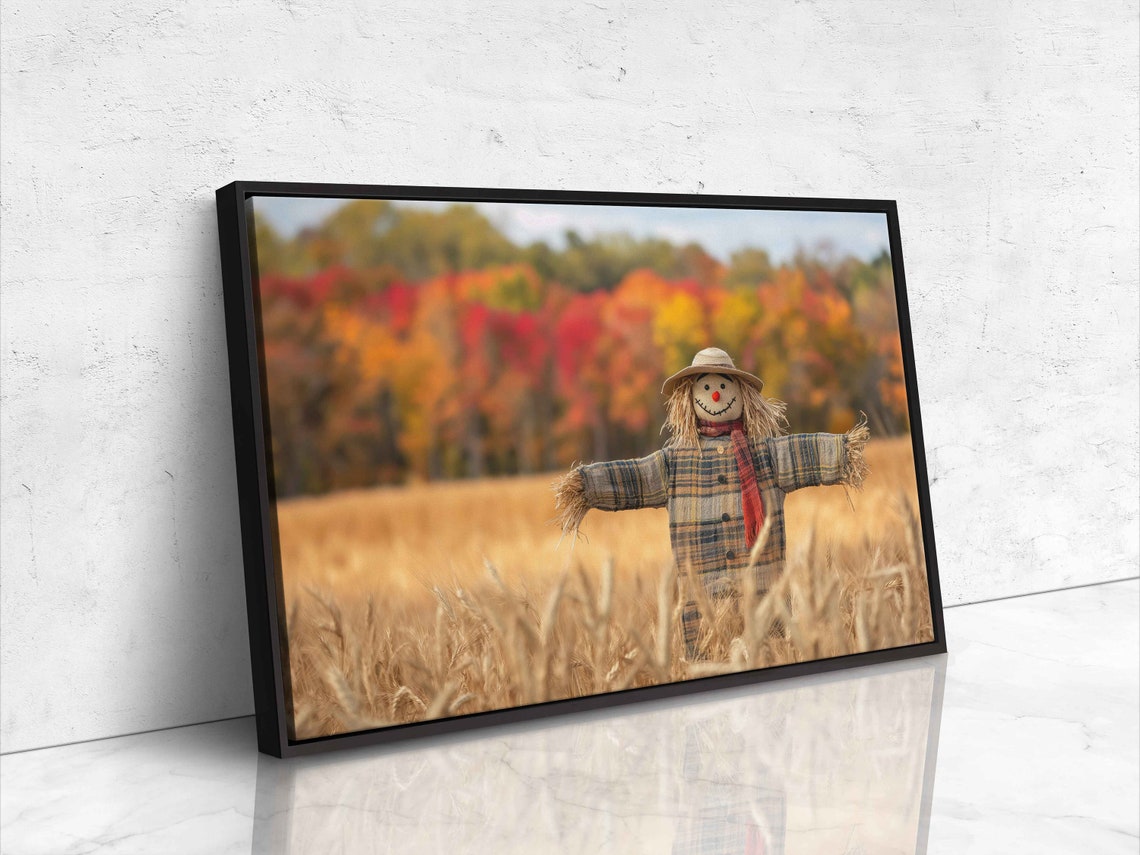 Scarecrow In Wheat Field With Fall Foliage Backdrop Art Poster - Image 4