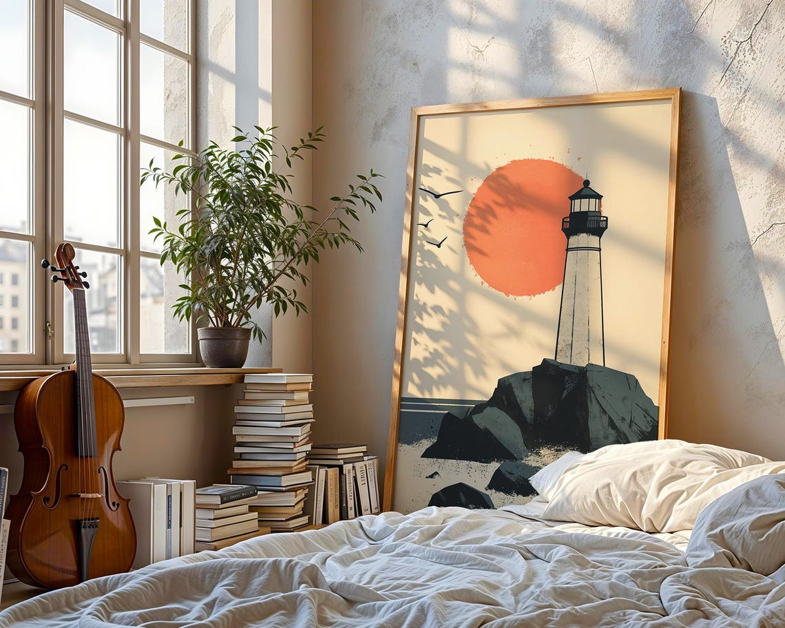 Minimalist Lighthouse on Rocky Shore Under a Big Orange Sun Poster - Image 4