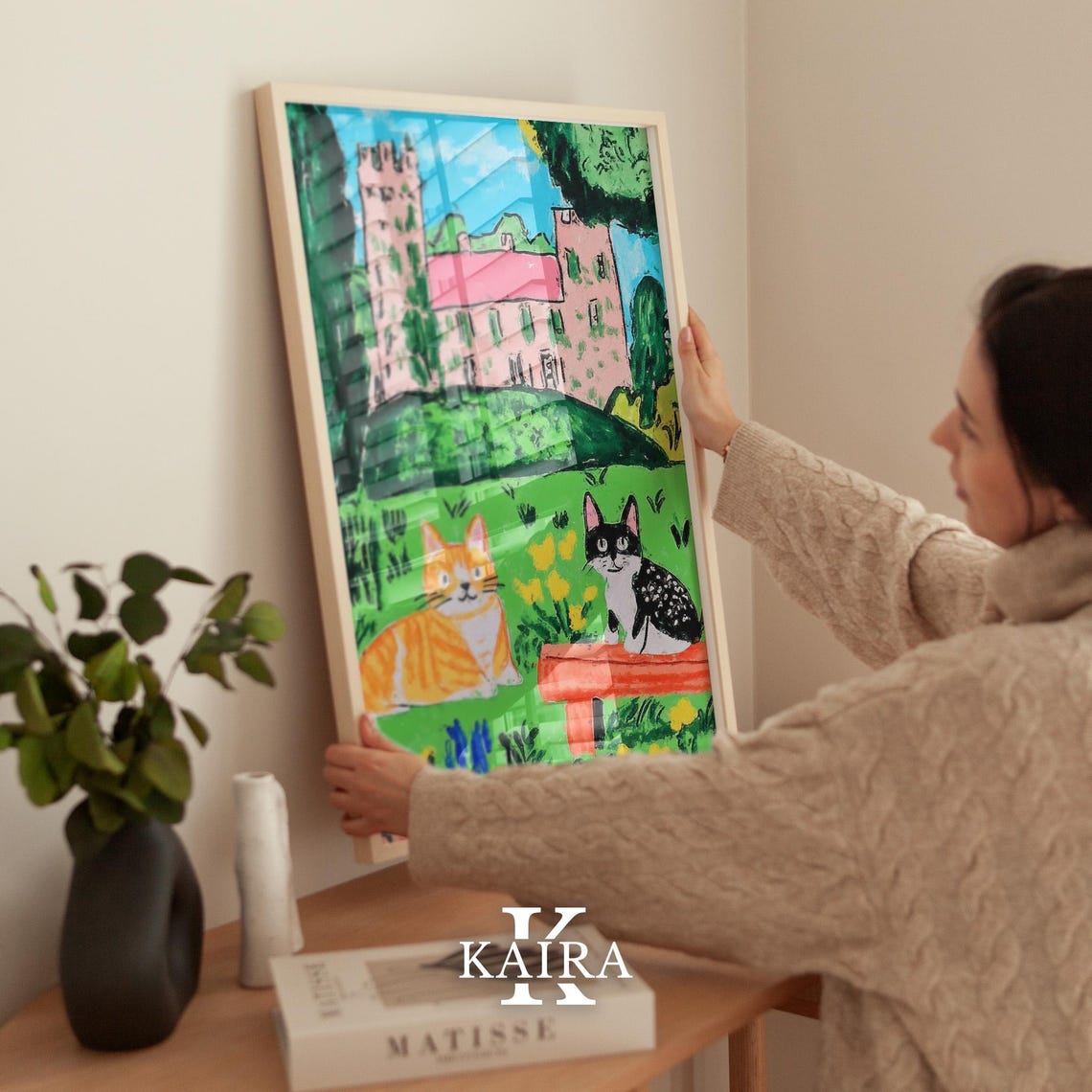 Two Cute Cats Relaxing in a Garden With a Pink Castle Poster - Image 2