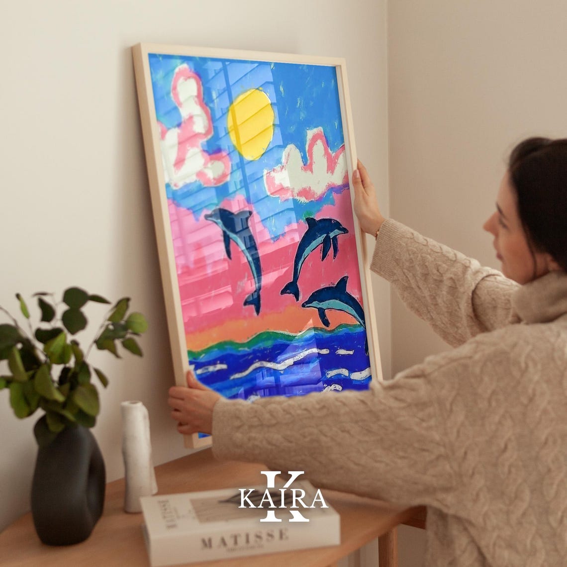 Three Dolphins Leaping Over Ocean Waves Under a Sunset Sky Poster - Image 2