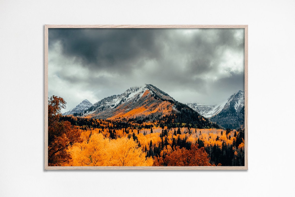 Golden Autumn Forest Beneath Snow Capped Rocky Peaks Photo Poster