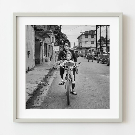 Mother Biking with Child Down Lively Street Black White Photo Poster
