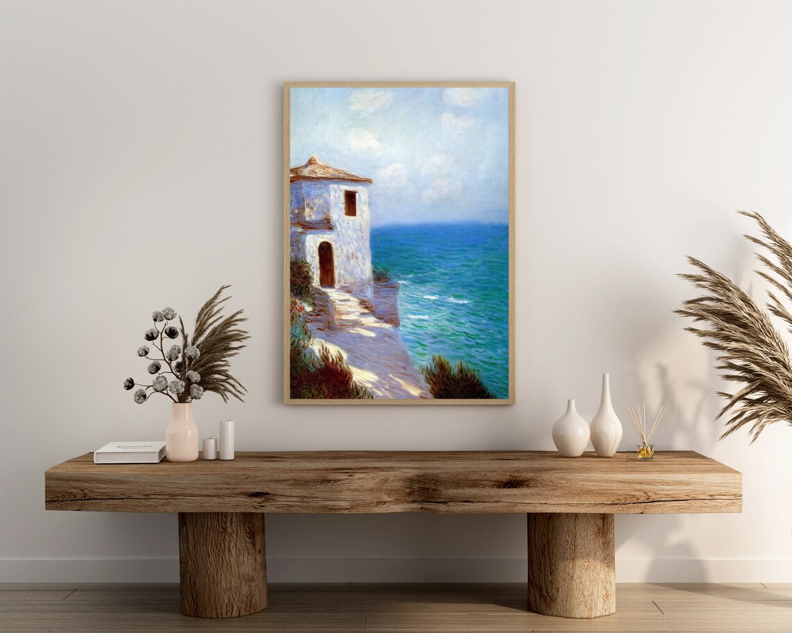 White Cliffside House Above a Bright Blue Sea Painting Poster - Image 3