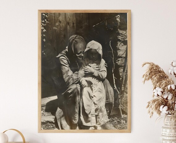 Vintage Horror Sepia Photo of Ghostly Figure Holding a Child Poster