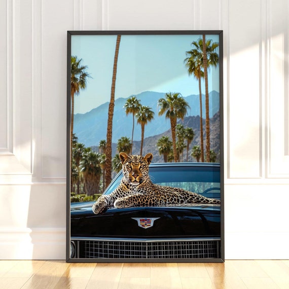 Leopard On Black Cadillac Hood Against Mountain Palm Backdrop Poster
