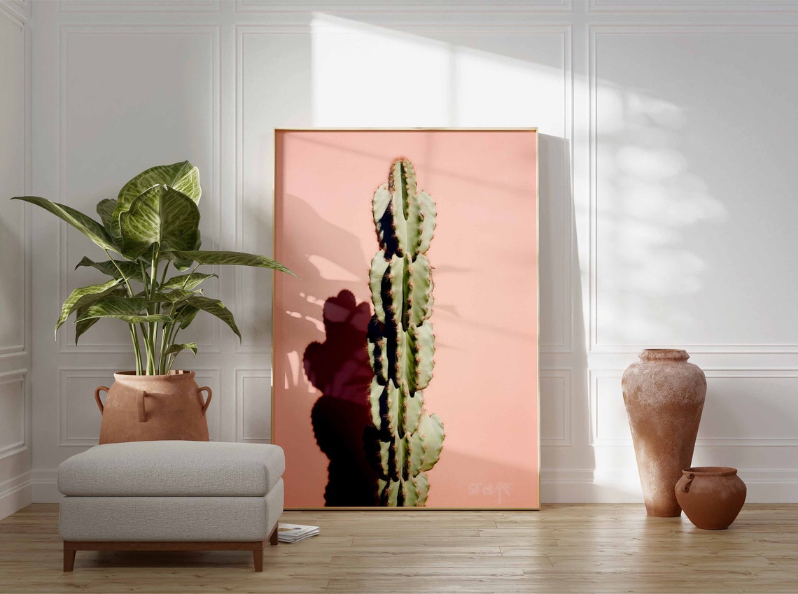Solitary Tall Cactus Column with Bold Shadow on a Peach Poster - Image 3