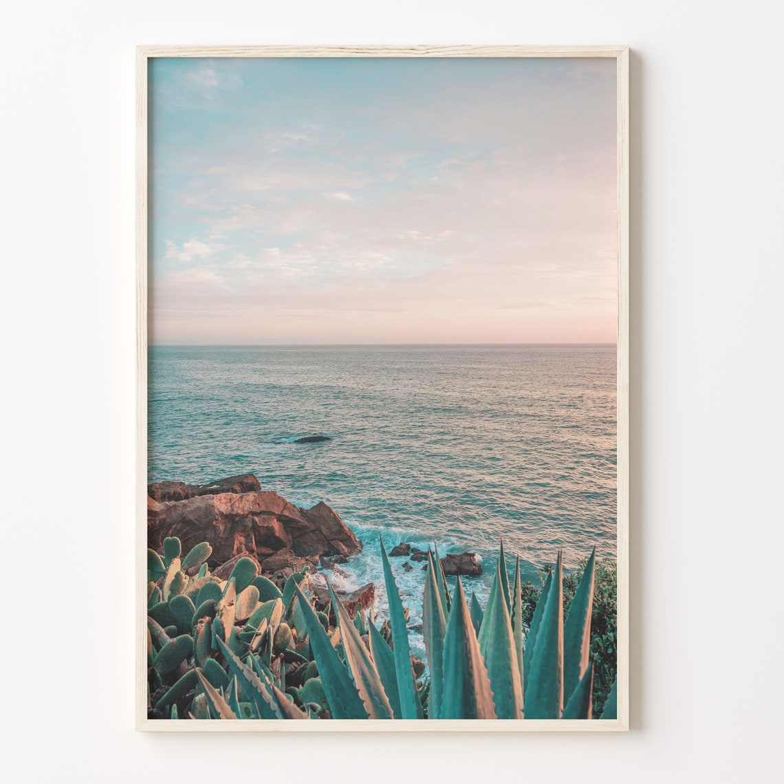 Agave Plants Over Rocky Coastline With Turquoise Ocean Poster