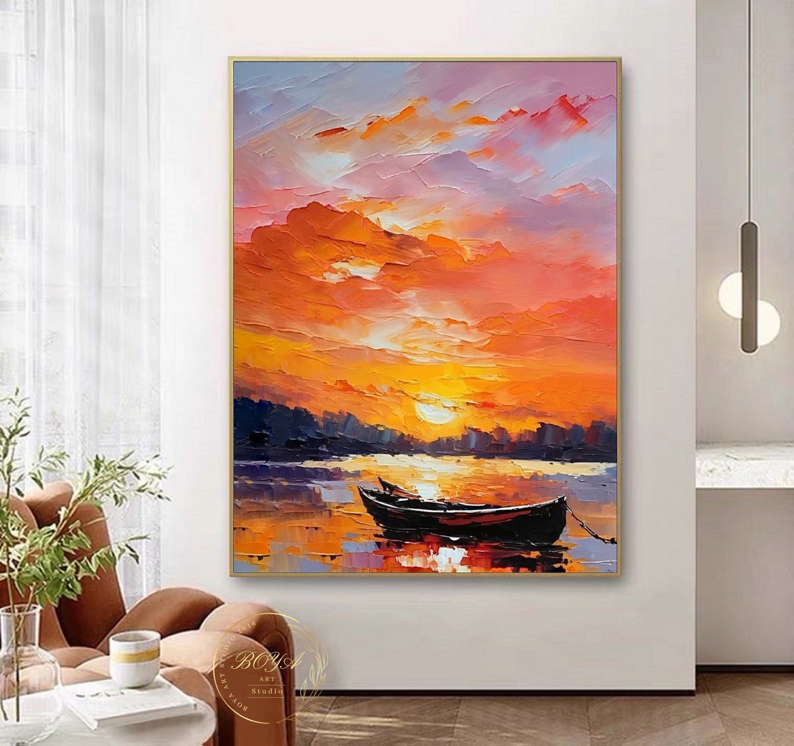 Vibrant Orange Sunset and Lone Boat Over Golden Water Poster - Image 2