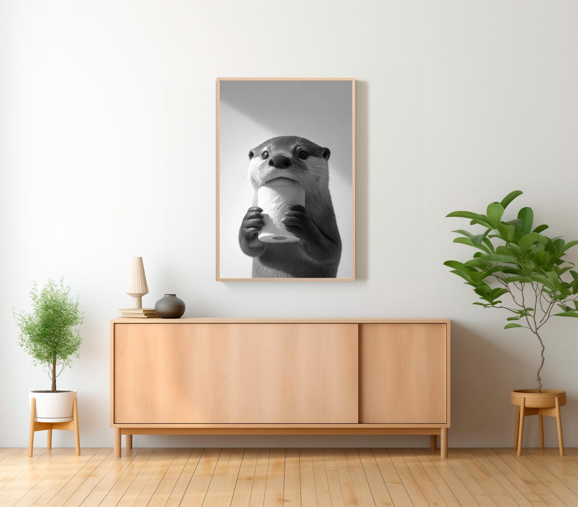 Funny Black and White Otter Biting a Toilet Paper Roll Poster - Image 2