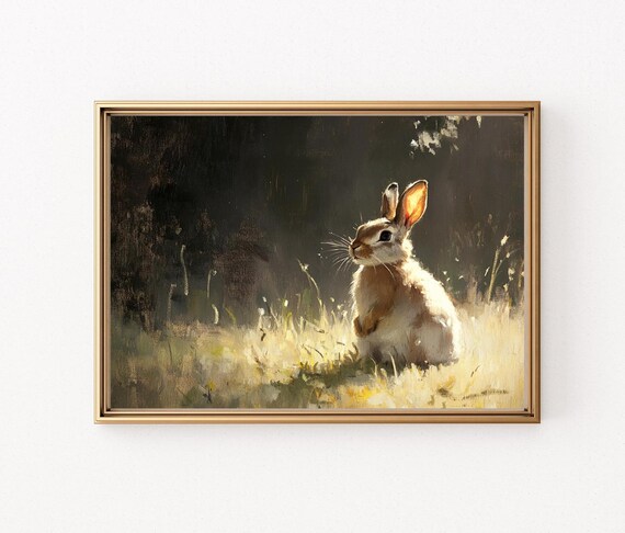 Charming Vintage Rabbit Sitting Alone in Sunlit Meadow Grass Poster