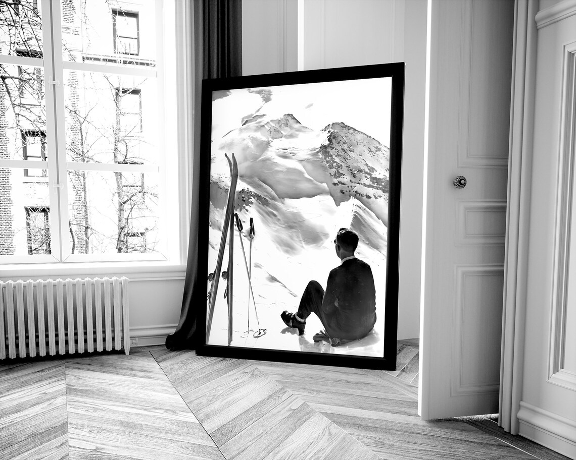Man Sitting On Snowy Mountain Peak Gazing At Winter Summit Views Poster - Image 4