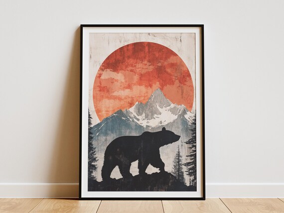 Bear Silhouette Under a Red Sun Snowy Mountain Landscape Poster