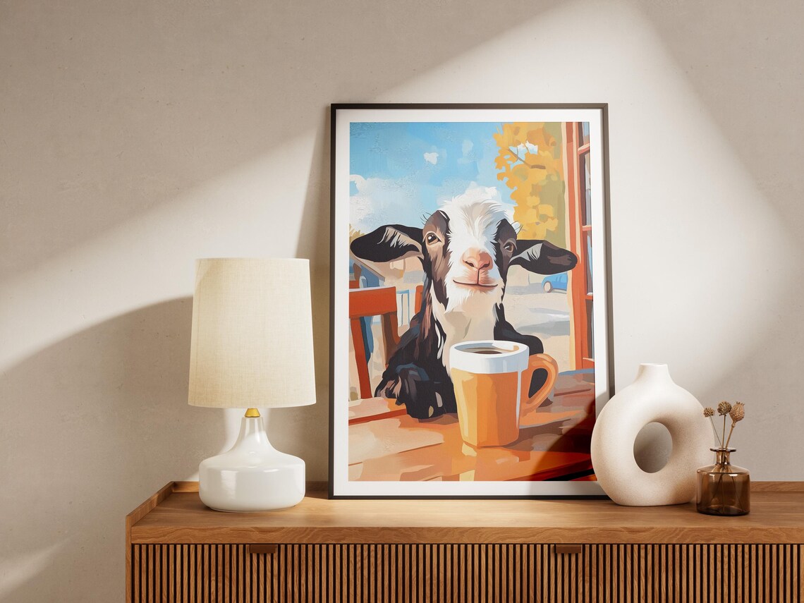 Adorable Baby Goat with Big Ears and an Orange Coffee Mug Poster - Image 4