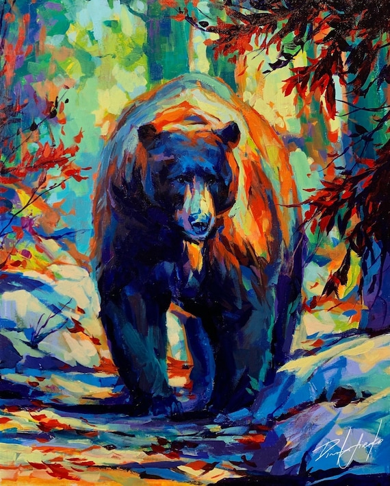 Black Bear Walking On An Autumn Trail With Red And Orange Fall Foliage Poster