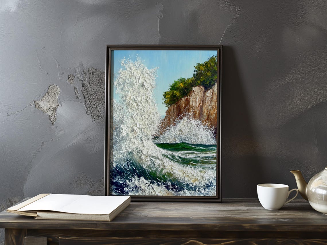 Towering White Spray Wave Breaking Beside a Rocky Cliff Poster