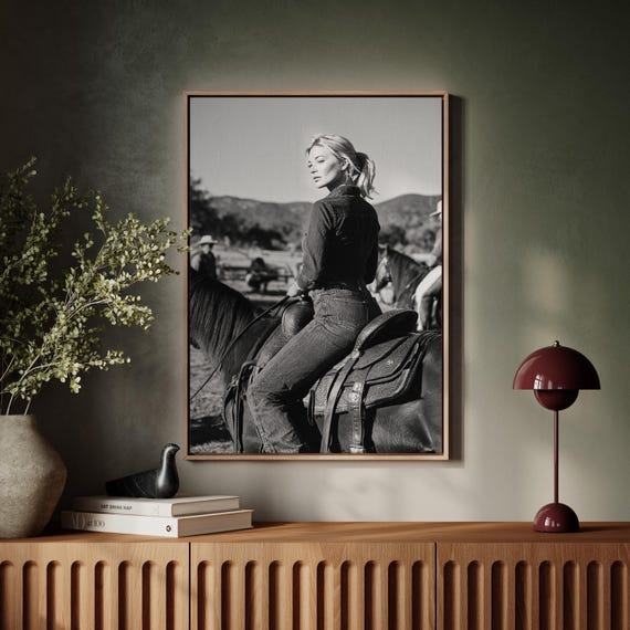 Cowgirl In Denim On Horseback