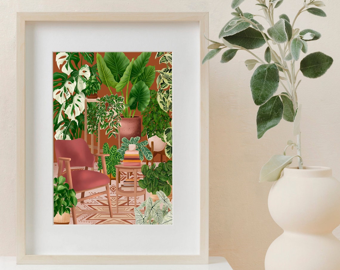 Pink Armchair Reading Corner with a Book Stack and Monstera Poster - Image 3
