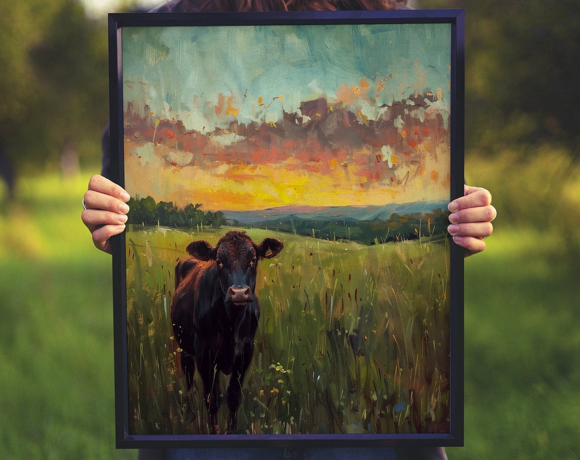 Black Cow in a Green Pasture Under a Beautiful Glowing Sunset Poster - Image 5