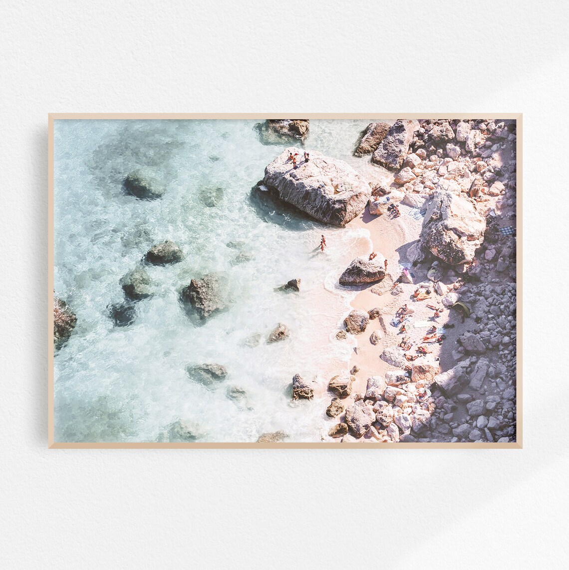 Aerial View of a Rocky Sardinia Beach Shore with Swimmers Poster