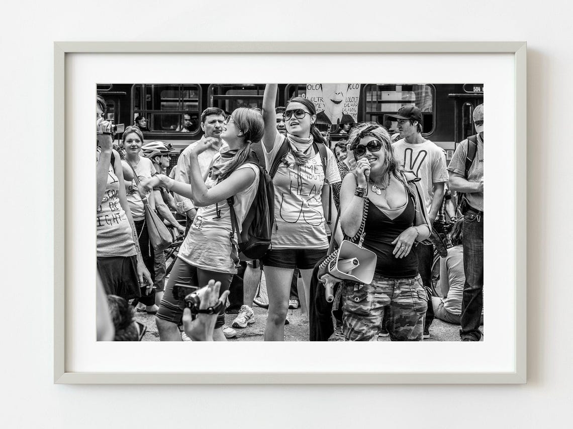 Black and White Photograph of a Street Protest March Crowd Poster