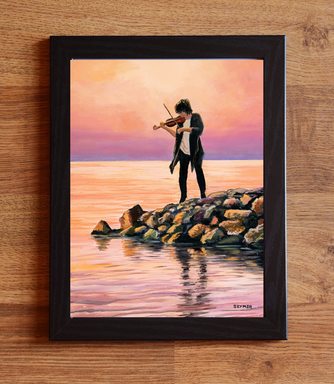 Violinist Playing on a Rocky Shore at Sunset over the Sea Poster - Image 5