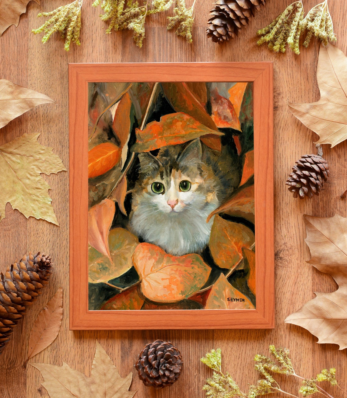 Calico Cat with Green Eyes Hiding among Autumn Leaves Poster - Image 4
