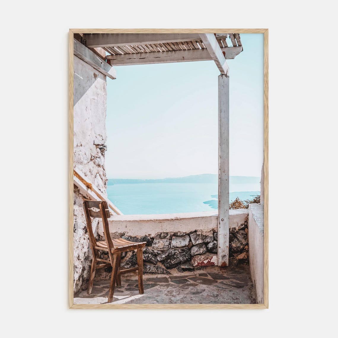 Whitewashed Terrace Chair Overlooking a Coastal Sea View Poster