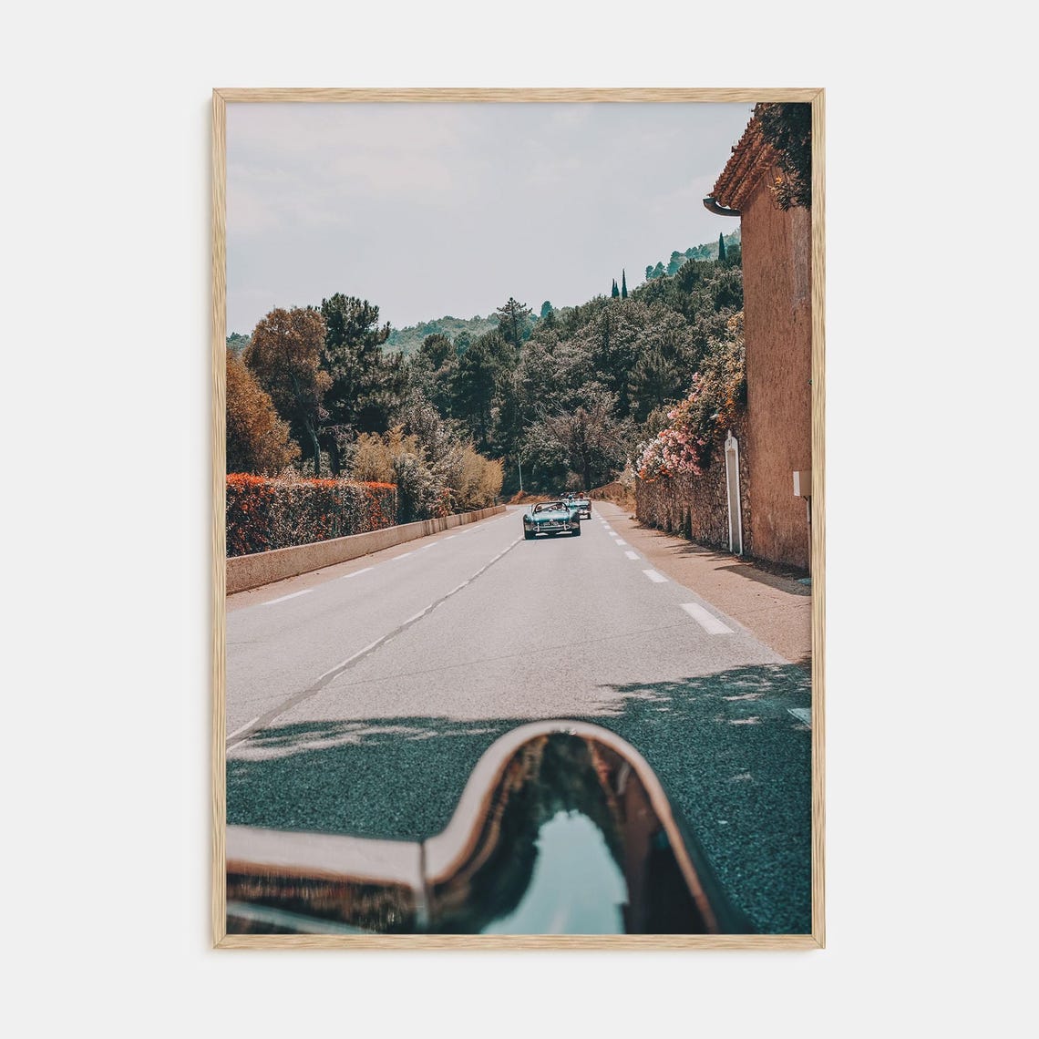 Classic Convertible Driving a Tree-Lined Country Road Poster