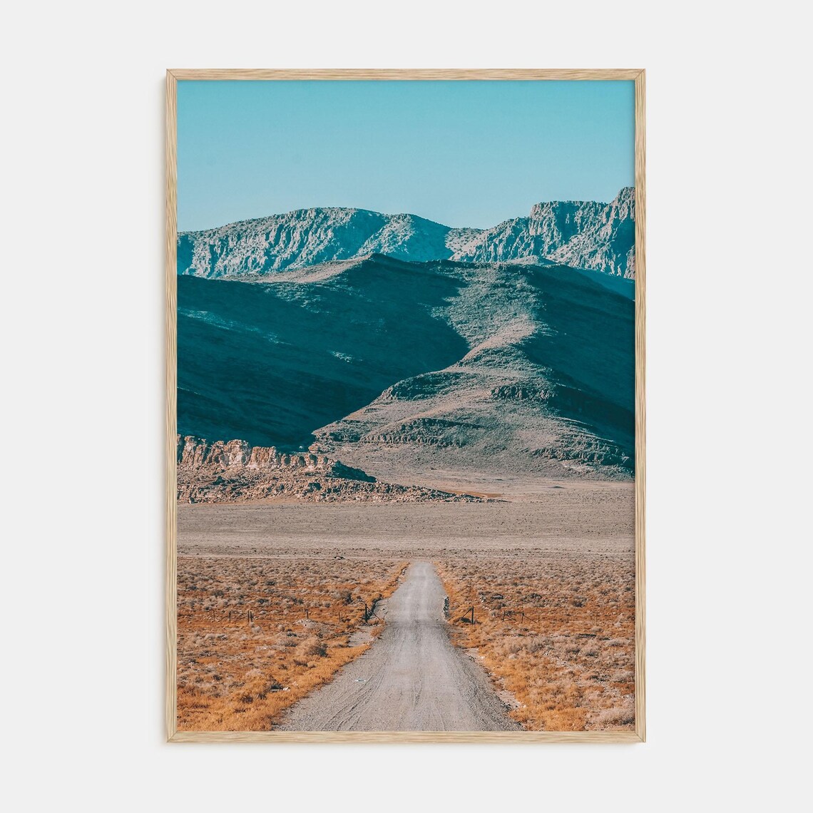 Desert Dirt Road Leading to Rocky Mountains Landscape Poster