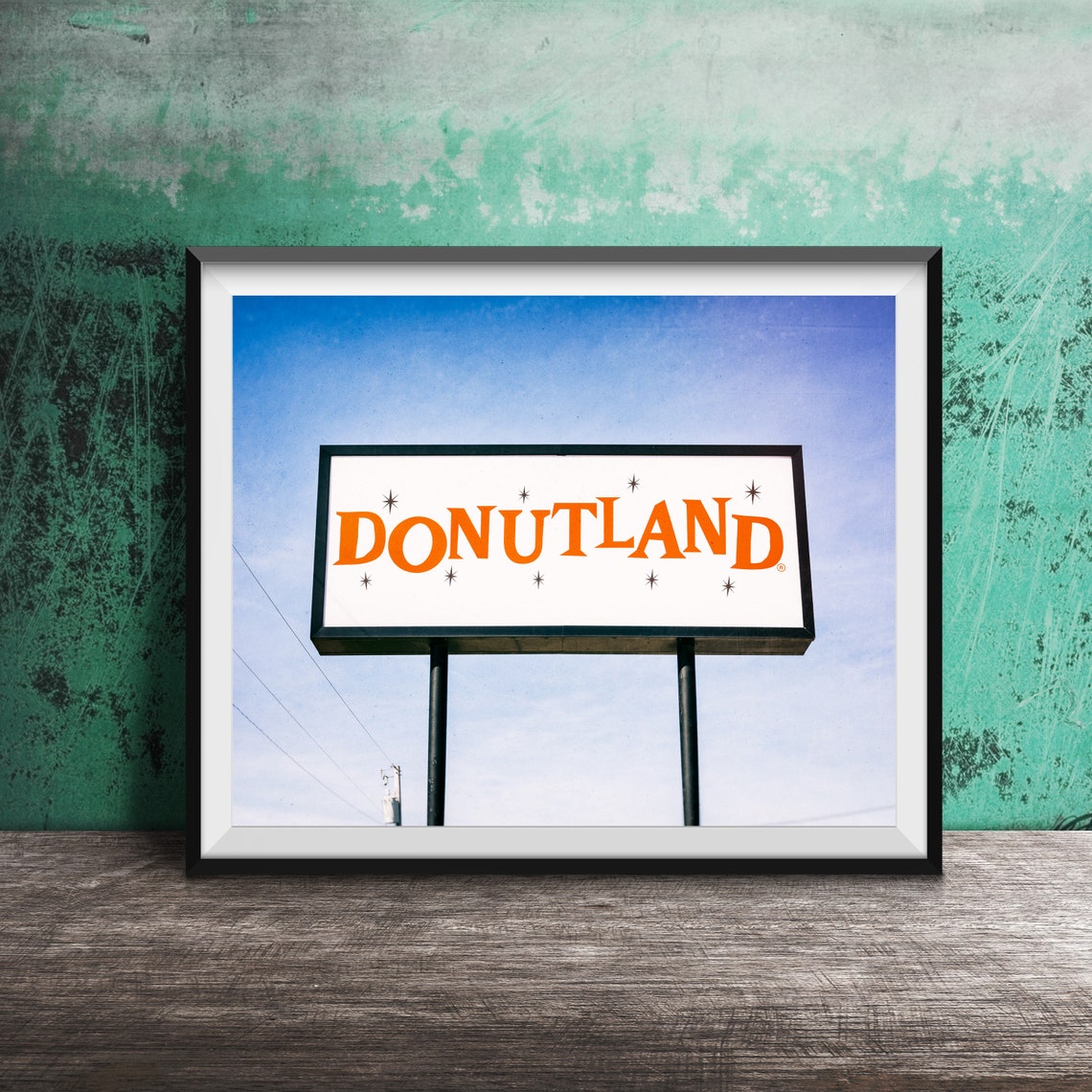 Donutland Vintage Orange Roadside Sign Against Blue Sky Poster
