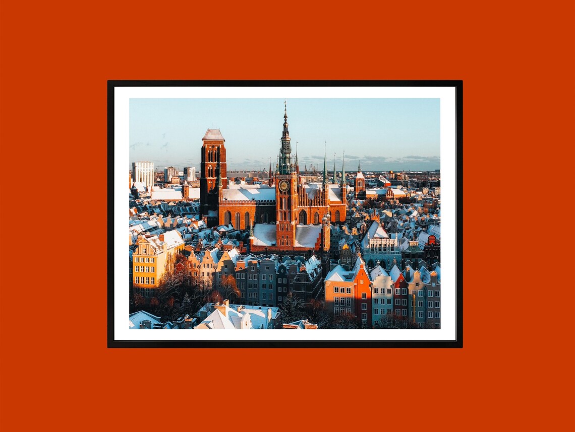 Gdansk Old Town in Winter With Snowy Church Towers at Golden Hour Poster