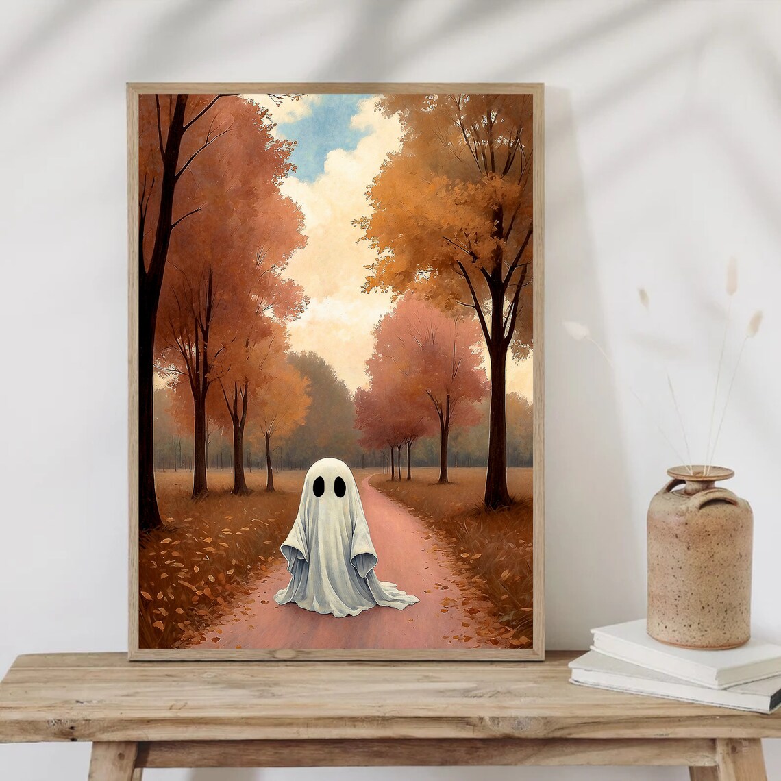A Lone Ghost Strolling A Winding Path Through Blush Tone Autumn Woods Art Print - Image 5