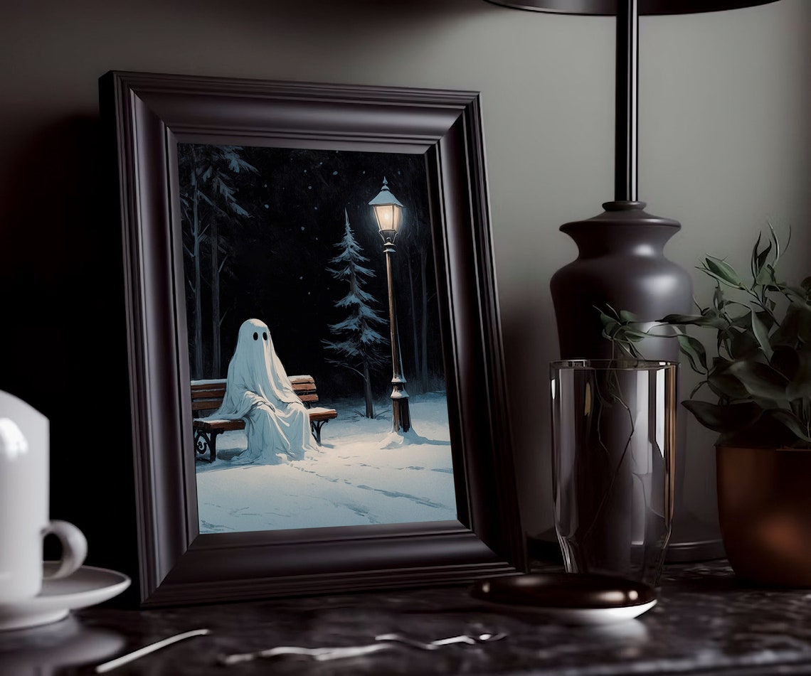 Ghost Resting on Snowy Park Bench Under Glowing Street Lamp Print - Image 3
