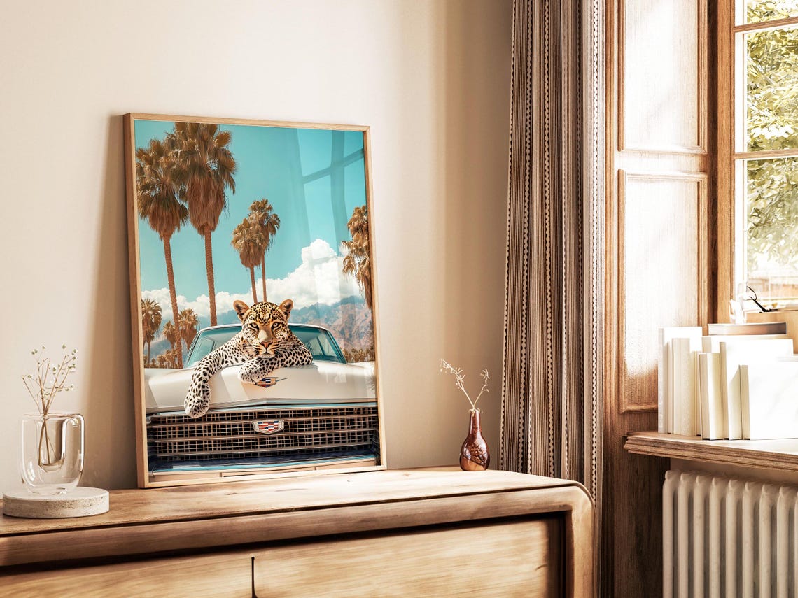 Leopard Draped Over White Cadillac Hood Beneath Palm Trees Poster - Image 4