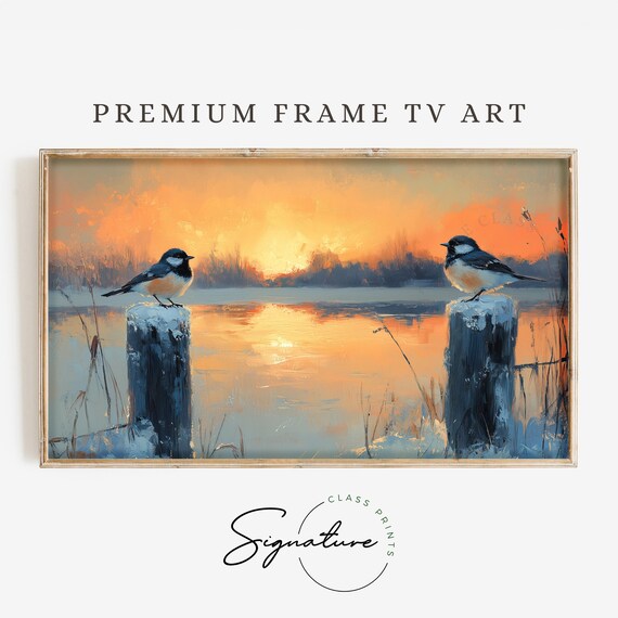 Winter Songbird Pair On Snowy Posts At Orange Lakeside Sunset Art Poster