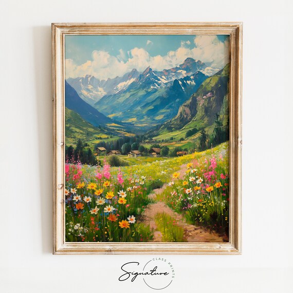 Spring Alpine Valley Flower Path Toward Cabins And Snowy Peaks Poster