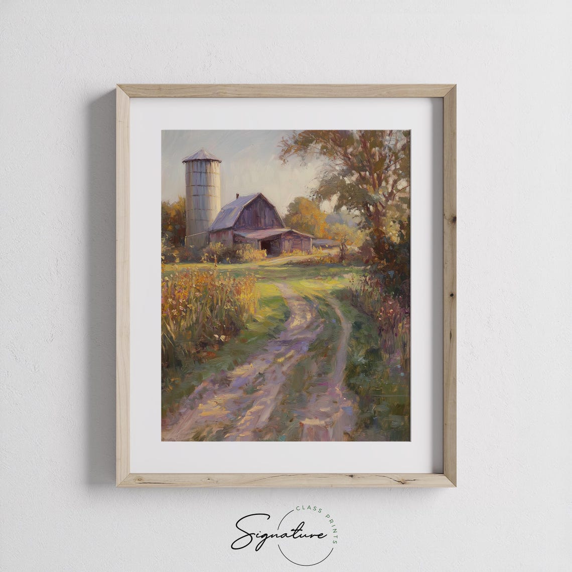 Old Red Barn With a Tall Silo Beside a Sunlit Country Road Poster - Image 3