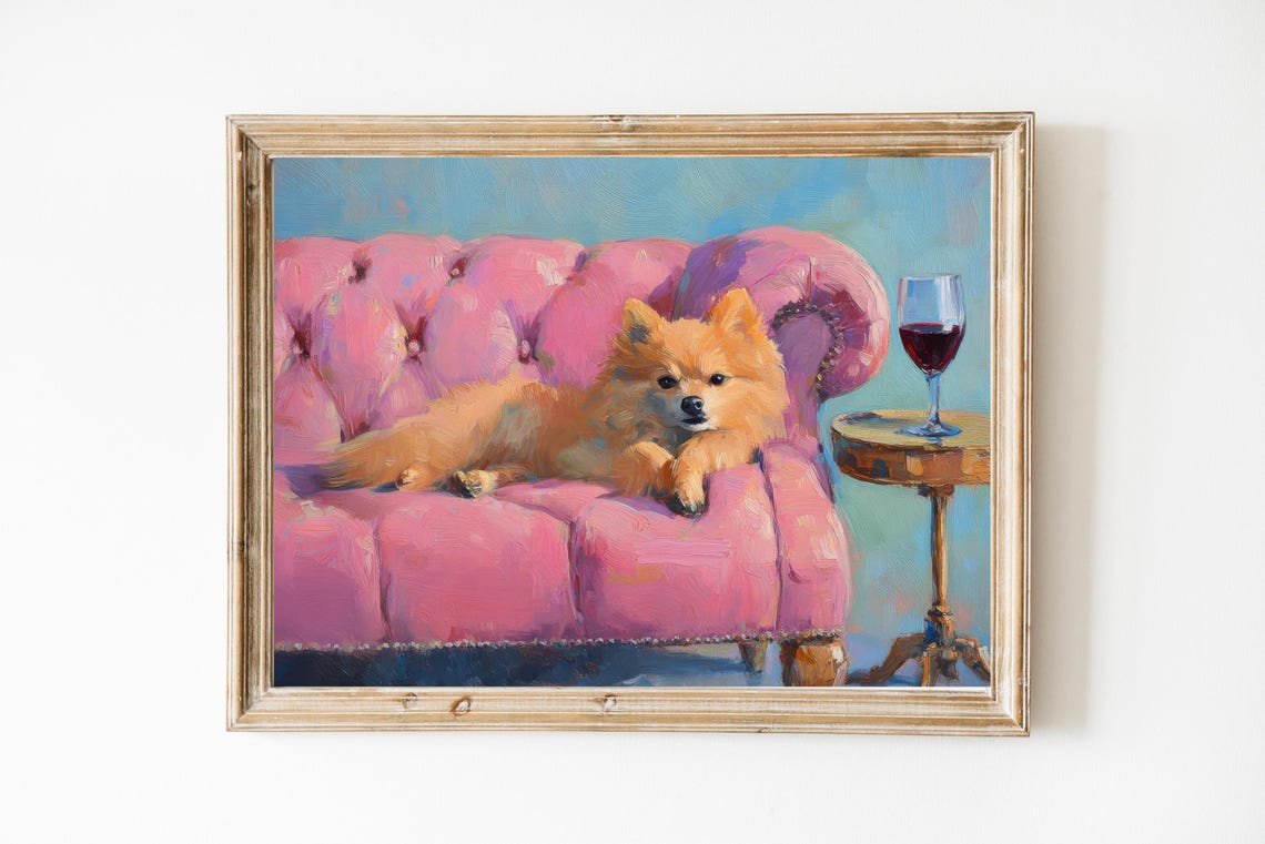 Pomeranian Dog on Pink Velvet Sofa With Red Wine Glass Poster