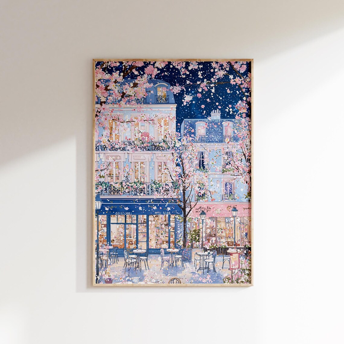 Parisian Cafe Under Cherry Blossoms at Night Romantic City Lights Poster