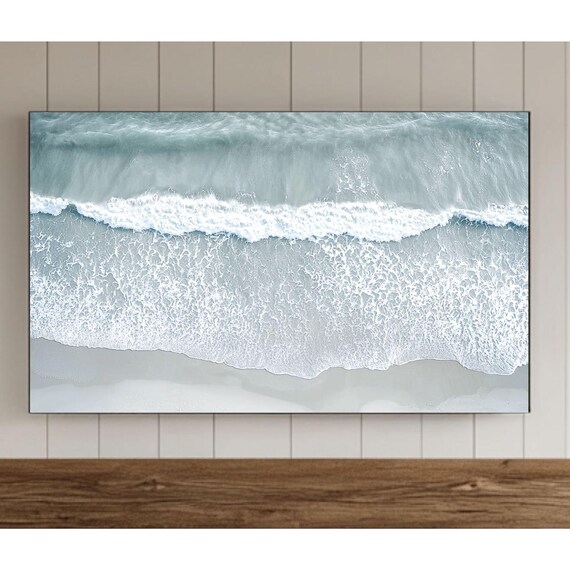 Aerial Ocean Wave View with White Foam on Pale Sand Beach Poster
