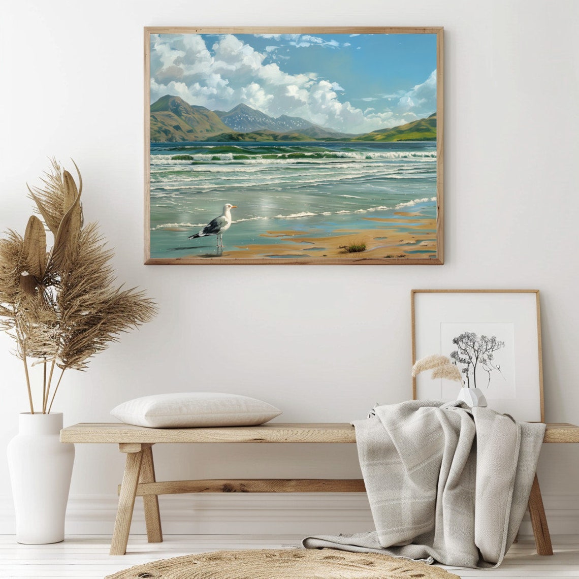 Lone Seagull Standing on a Beach with Waves and Mountains Poster - Image 2