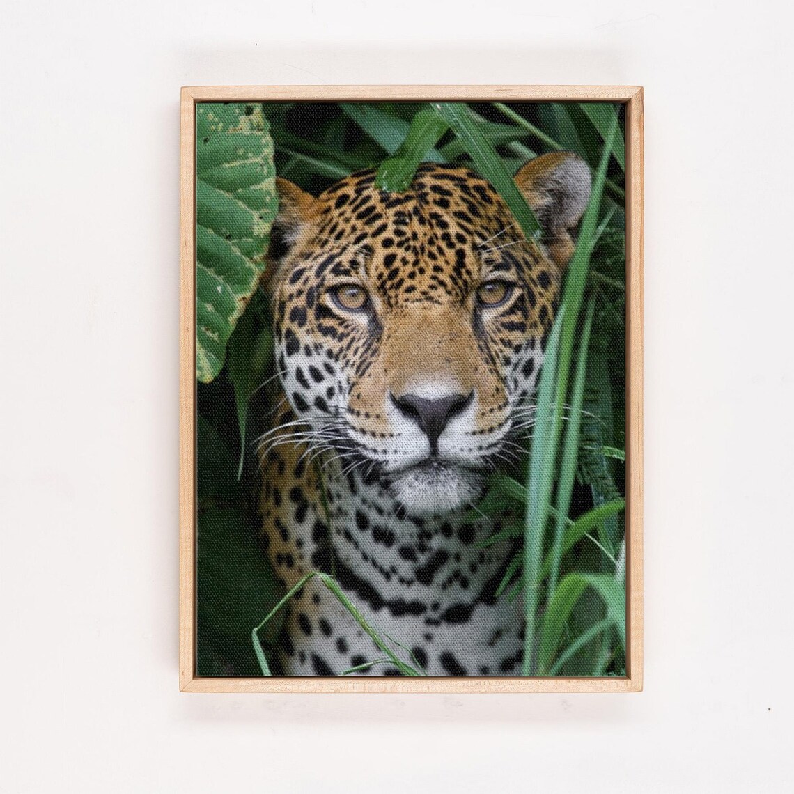 Leopard Peeking Through Lush Green Jungle Leaves Portrait Poster - Image 4