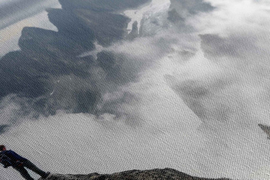 Climber On Rocky Summit Overlooking Cloud Sea Peaks View Print - Image 2
