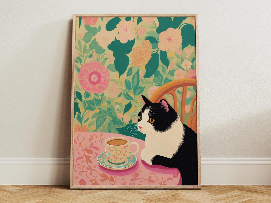 Black And White Cat Holding A Tea Cup At A Floral Table Poster