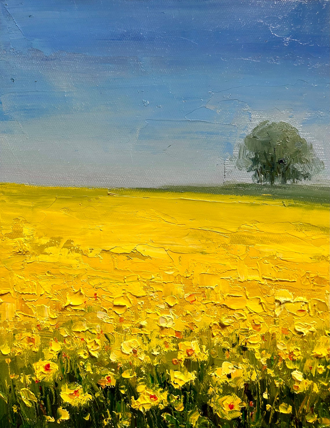 Bright Yellow Rapeseed Field With Lone Tree Under Blue Sky Poster - Image 5
