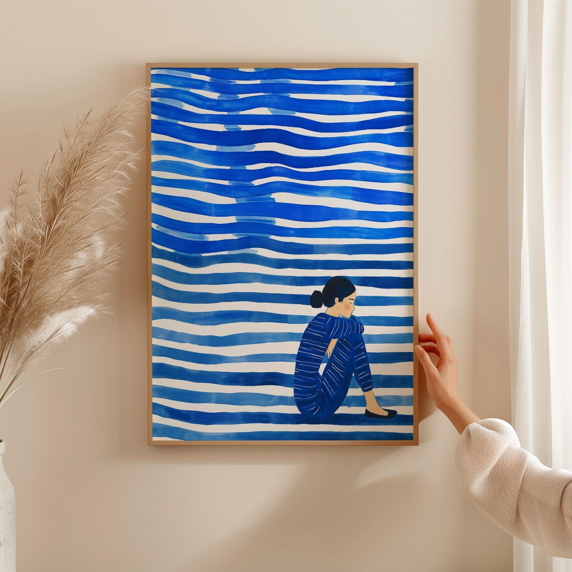 Woman Seated Among Bold Blue Waves in Striped Clothing Poster