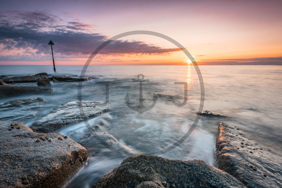 Tywyn Beach Sunset Over Rocky Shore And Calm Sea Wales Poster - Image 3